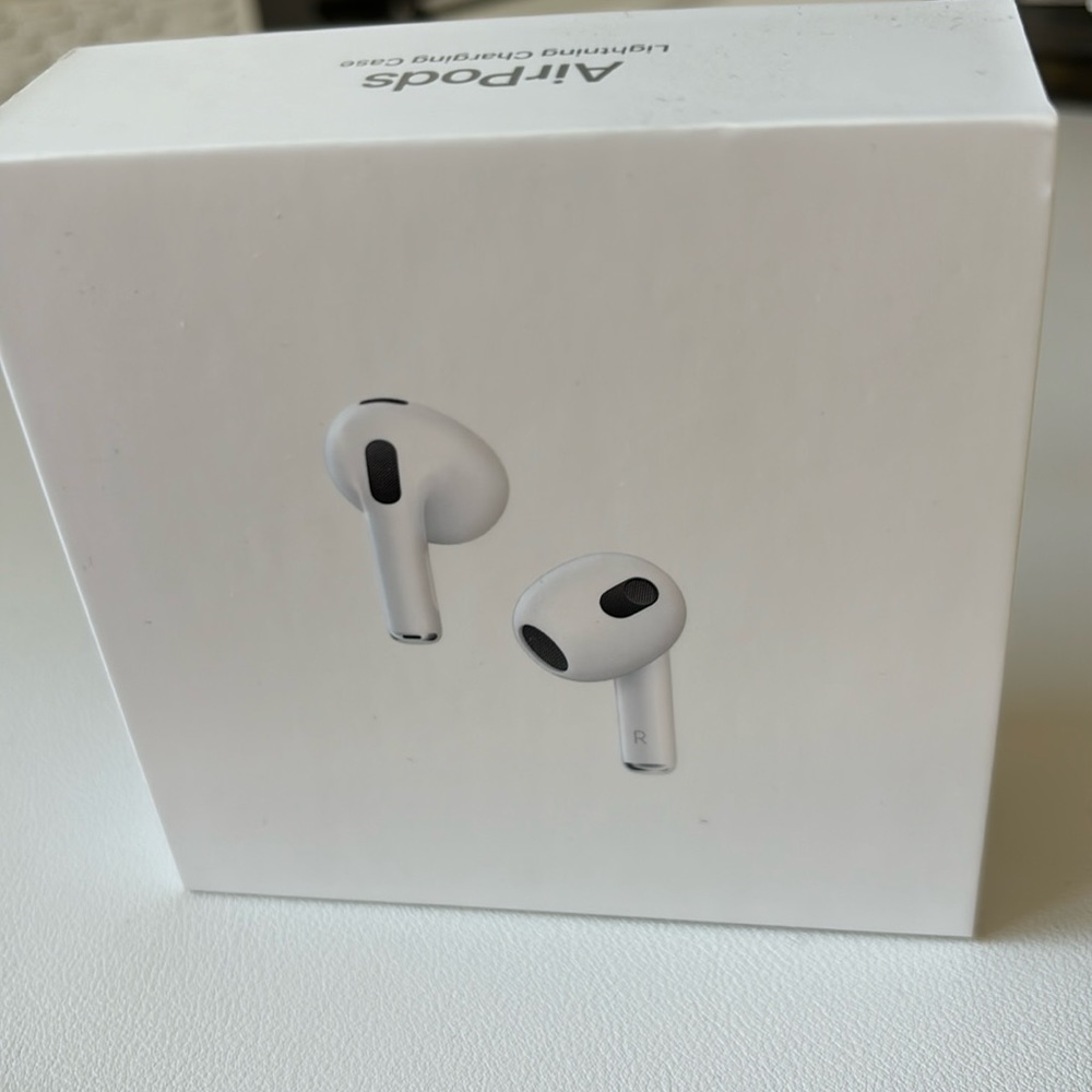 Apple AirPods - brand new in unopened box with charging case